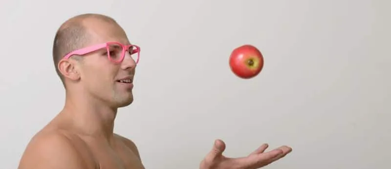 bald-man-with-an-apple-e1674601756660.webp